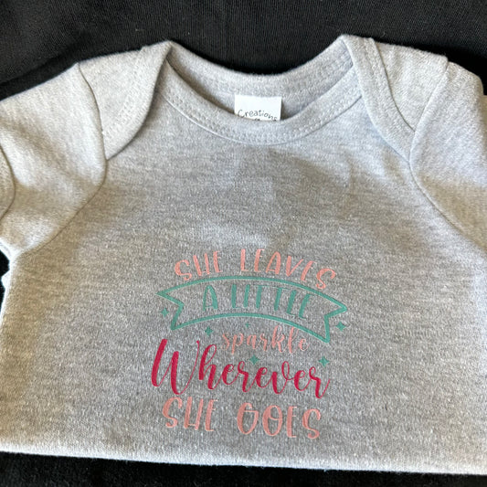 Baby Onesies - She Leaves a Little Bit of Sparkle Wherever She Goes